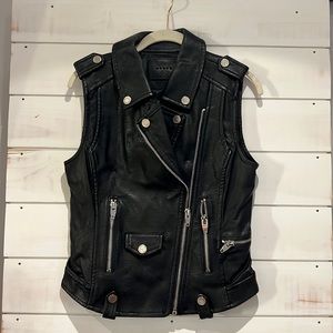 Unique, faux leather motto vest (looks like real leather), perfect condition.